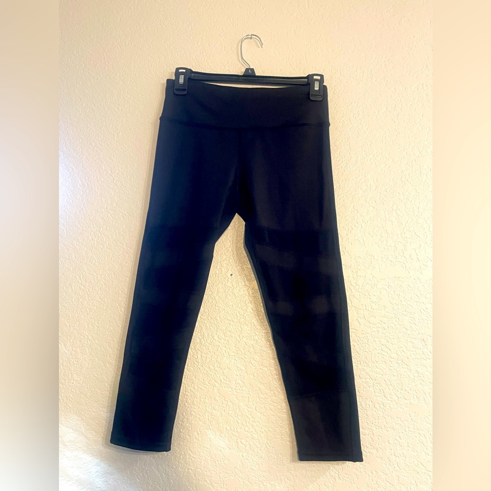 BCBGeneration black capri leggings with mesh size small.